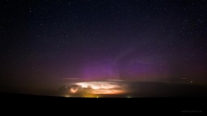 Aurora behind a buidling storm. Frame from Huelux timelapse